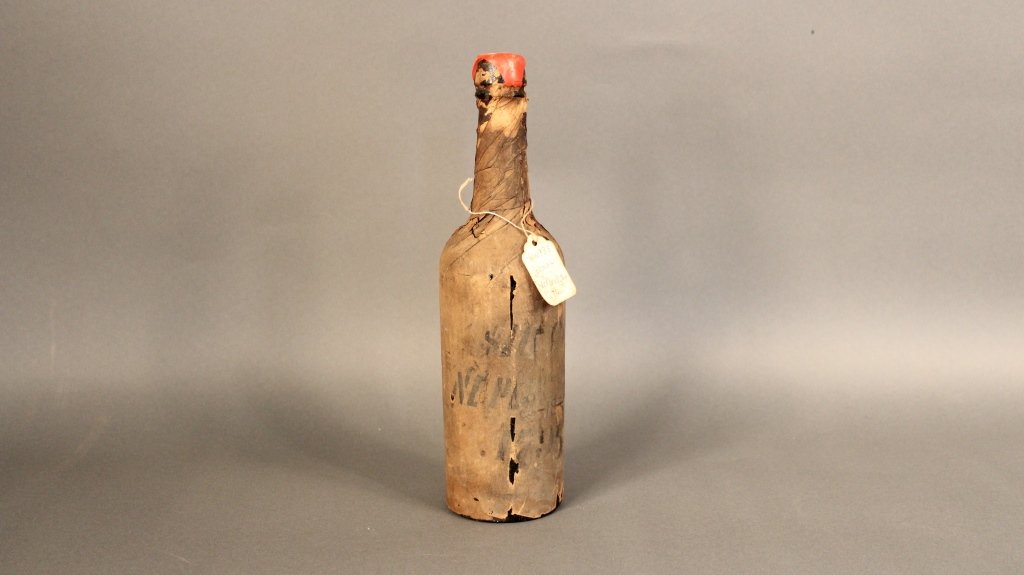 Rare bottle of NE Plus Ultra Cognac, 1795.: Direct from J.P. Morgan’s great-grandson comes this extremely rare bottle of “NE Plus Ultra” cognac, 1795 vintage. Still in it’s original wrap, the paper is marked in handwritten ink, “$1000