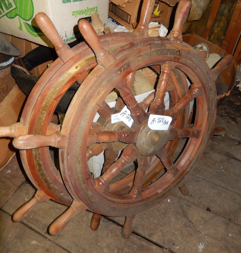 Two 36” ship’s wheels: Two, three-foot ship wheels with brass hugs and eight turned spokes.