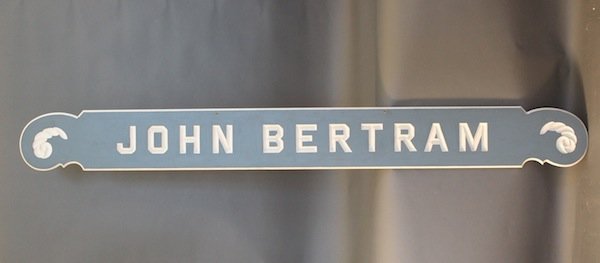 John Bertram sternboard from Anthony: Carved sternboard from the main dining room of Anthony’s Pier 4. 84” x 9”