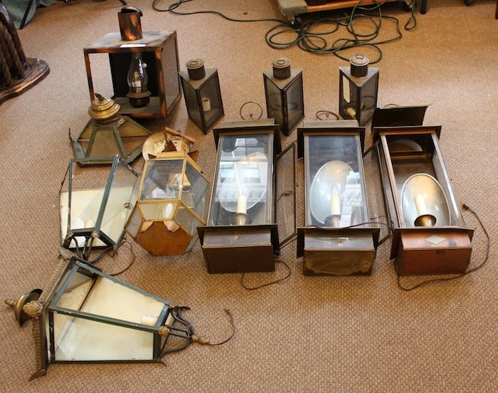 Ten various light fixtures, Pier 4: Ten light fixtures removed from the walls of Anthony’s Pier 4. Some with dents and missing glass.