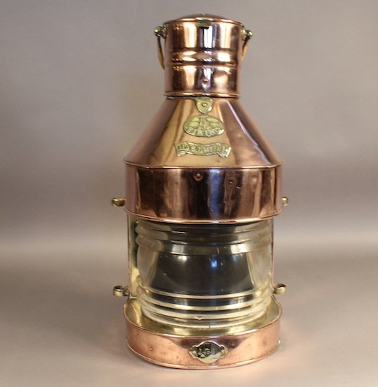 Viking Ship's Masthead Lantern: Copper ship's masthead lantern with glass fresnel lens and brass bezel. Vented chimney with brass carry handle. Bras maker's badge with Viking logo and masthead badge. A third plate is marked 1458. 14