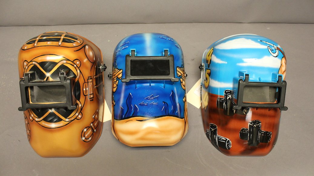 Welder's Masks with Diving Theme: Three custom painted welder's shields by artist Jay Lloyd of New Jersey who painted these for Tom Hering.