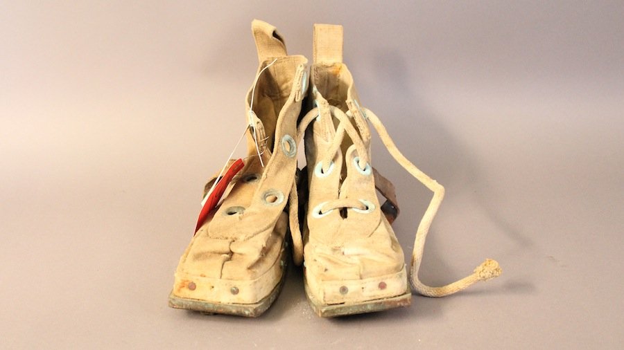 Diver's Boots: Pair of canvas and brass hard hat diver’s boots with brass soles, canvas uppers and leather reinforced heels.