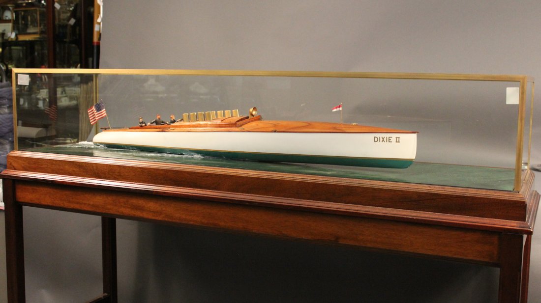 Speedboat diorama by William Hitchcock: Noted marine model maker William Hitchcock put this speedboat race boat diorama together with two men onboard a sleek runabout. Set at it’s waterline and cruising through calm waters. Mounted into a