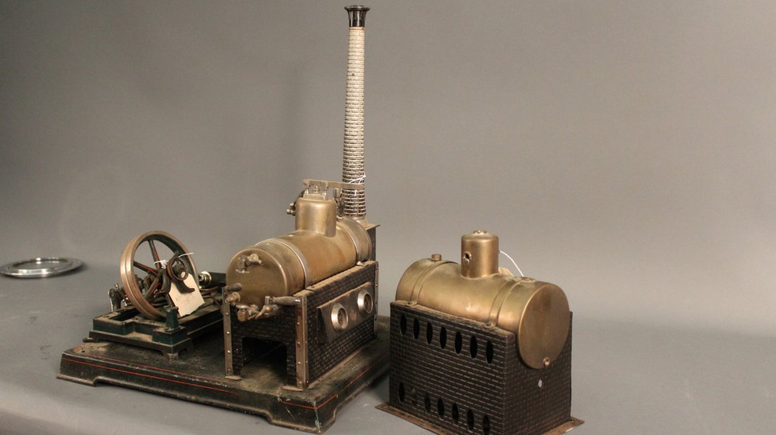 Ornate model double-boiler steam power plant in need of: Unknowm manufacturer, very fine engine and boilers, in need of re-assembly and reconditioning. Engine is double cylinder simple with single eccentric non-reversing valvegear. 21 x 16 x 25