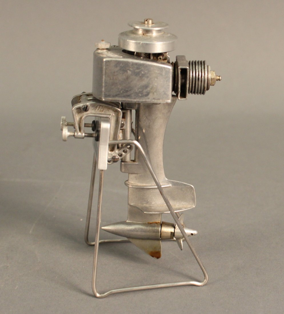Mounted outboard motor by Atwater: Outboard motor model by Atwater on a stand with the firm’s name. Top of engine has model name “Sea Fury”