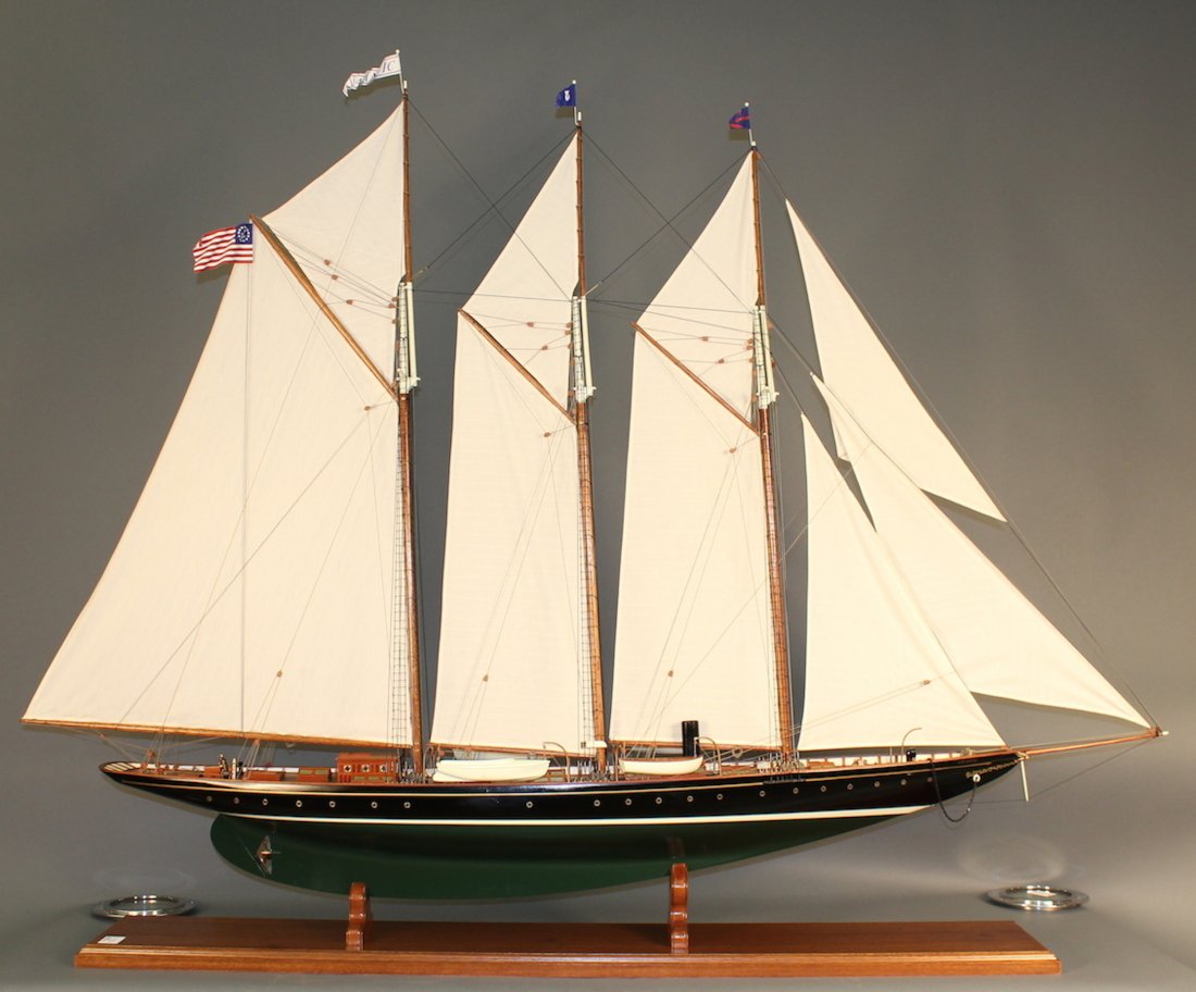 Six-foot model of the Atlantic: Finely detailed model of the three masted auxiliary schooner “Atlantic”. Rigged with a full suit of linen sails. Deck is planked and caulked mahogany with many details and brass fittings. Model Di