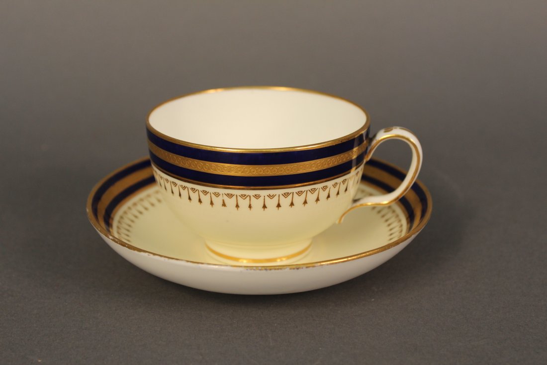 Steam Yacht Almy Tea Cup and Saucer: Tea cup and saucer made by Mintons for Gilman Collamore of New York. Bottom of the cup and saucer are marked steam yacht Almy. Diameter is 5” x 2 1/2” tall.