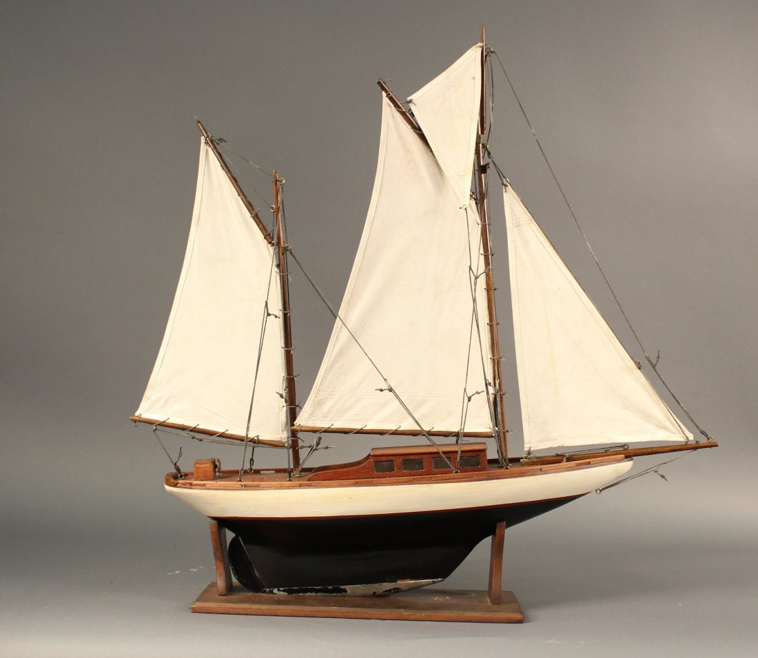 Vintage Pond Yacht with Two Masts: Old pond boat with two masts and a suit of four sails. Rich varnished deck. 30 x 7 x 29