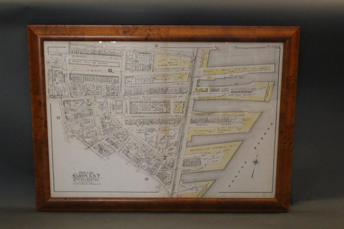 Map of Boston Waterfront Wards 6&7: Framed copy after a original showing Bostonâ€™s waterfront wharves. Long, Commercial, Central, Rowes, and T Wharves are all shown as are many tenants, owners, and addresses. Framed in burlwood. O