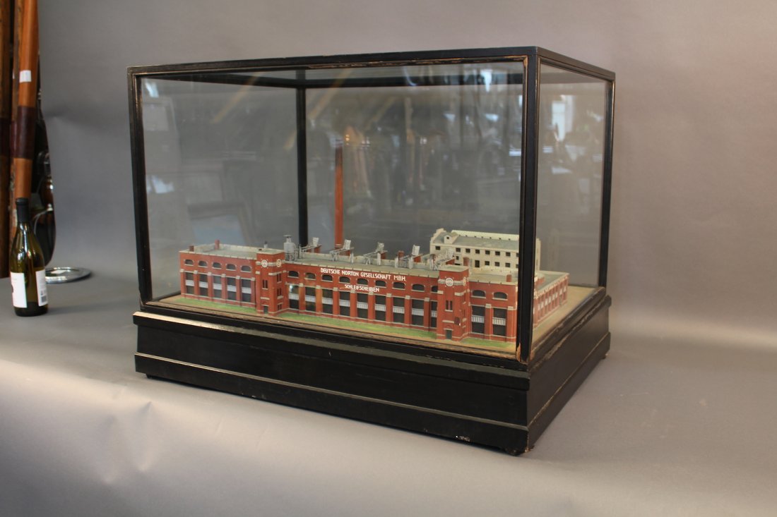 Scale Model of a Norton Company Factory: Factory model by Peter Koch showing the â€œDeutche Norton Gesellschaft MGH, Scheleifesheibenâ€. Showing an impressive brick factory complex with multi-floors. Signs with Norton logos adorn the