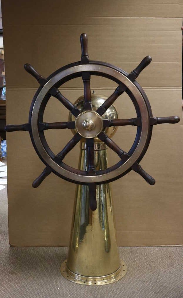 Yacht Wheel from The Montague Pub: Varnished yacht wheel fitted to an outstanding highly polished pedestal with internal gears. This fine relic was displayed in the famous Greenwich pub, The Montague. The pedestal is similar to one fou