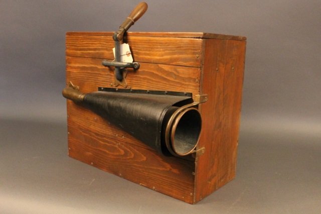 Lever Operated Ship's Foghorn: Lever operated ship's foghorn in working condition. A bellows activated design with external copper trumpet screwed to the side of the varnished hardwood box. Very loud. Dimensions: 16" H x 13" W x 20