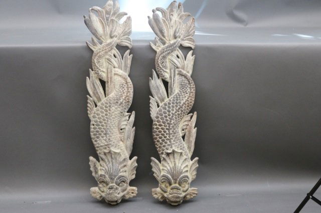 19th Century Cast Iron Dolphins: Ornate cast iron dolphins with tridents atop twisted tails. Quite heavy and sturdy. Dimensions: 37" L x 9" H *This lot is part of a maritime antique auction of ship models, nautical relics, marine pai