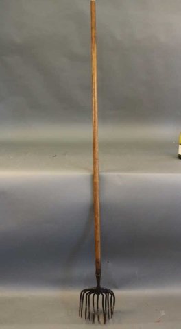 Clam Rake: Wooden clam rake with iron claw. Dimensions: 64" L. Weight: 10lbs *This lot is part of a maritime antique auction of ship models, nautical relics, marine paintings, boat parts, yachting collectibles,