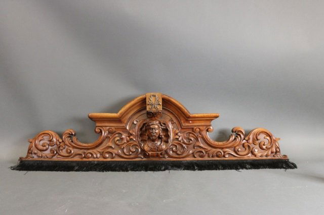 Heavily Carved Over Door Crown: Finely carved over door crown pediment. Substantial in size. Dimensions: 54" L x 5" W x 14" H Weight: 17lbs *This lot is part of a maritime antique auction of ship models, nautical relics, marine pain