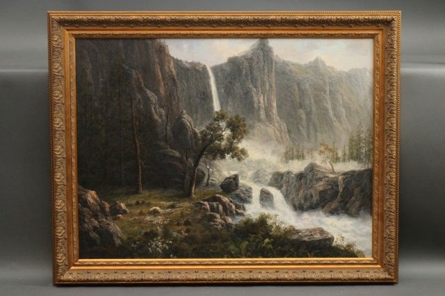 Rocky Mountain Oil on Canvas: Woodland scene oil on canvas with towering cliffs. Wood frame. Not an antique. Dimensions: 46" L x 37" H Weight: 16lbs *This lot is part of a maritime antique auction of ship models, nautical relics,