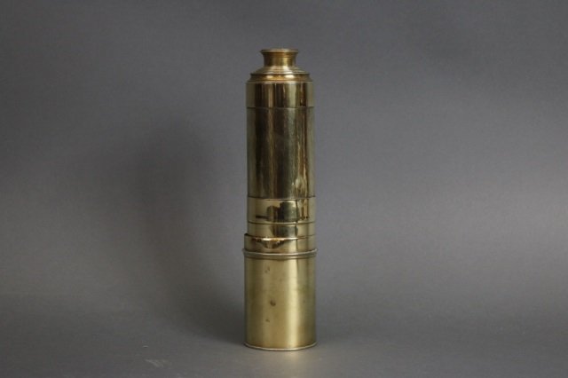 Five Draw Ship Captain's Spyglass: Five draw ship captain's spyglass with highly polished brass finish. Dimensions: 2.5" diam. x 40" L (open), 10" L (closed) Weight: 2lbs *This lot is part of a maritime antique auction of ship models,