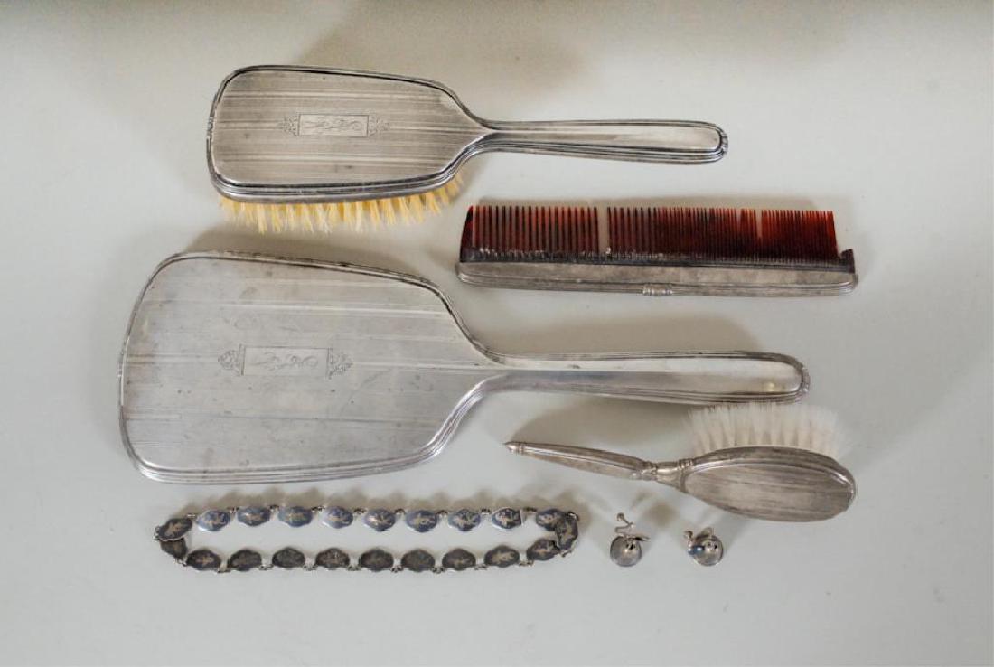 R. Blackinton Sterling Dresser Set, Siam Sterling: Lot includes seven pieces: 1. Two-piece sterling dresser set by R. Blackinton & Co., 12 1/4"L hand mirror and 9 1/2"L brush, each marked on handle with manufacturer's mark, engraved monogram---2. Ster