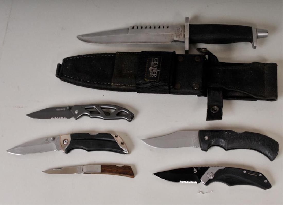 6 Gerber Knives, Including BMF Survival Knife: Six Gerber, Portland, Oregon knives including: 1. Gerber sawback basic multi-function (BMF) survival knife, Serial No. 024943, black Cordura sheath---2. Gerber Gator 650 Lockback Combo Edge knife---3.