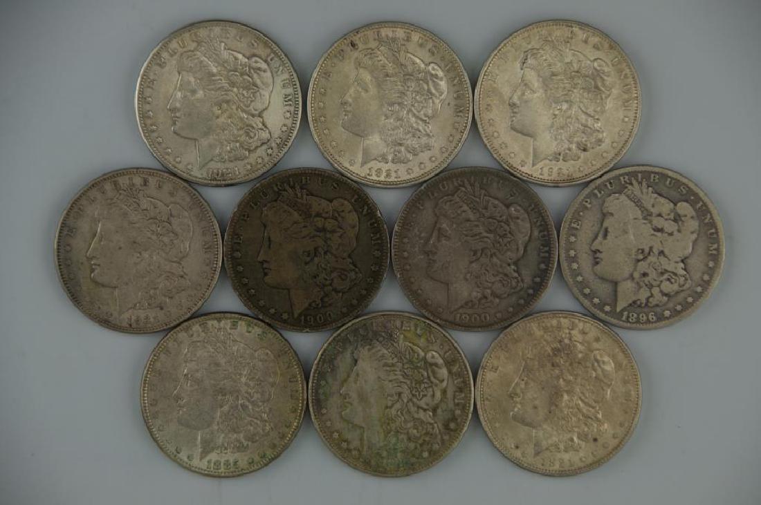 10 Morgan Silver Dollars: 10 Morgan Silver Dollars. 1885-P, 1896-O, 1900-O, 1900-P, 1921-P (x4), 1921-S (x2). (Ref 1)