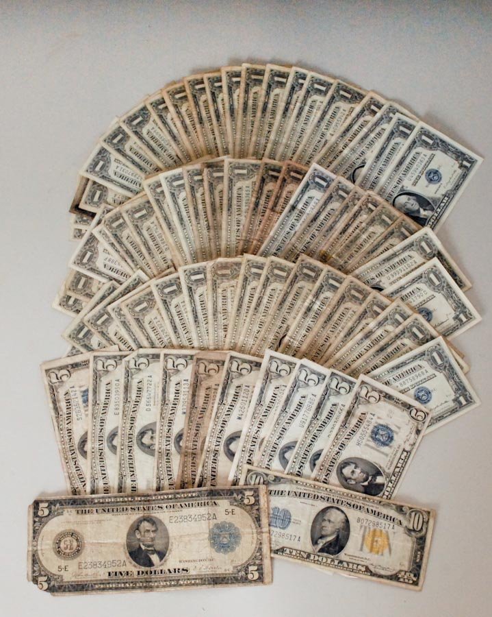 72 Silver Certificates and $5 Federal Reserve Note: One (1) 1914 large size $5 Federal Reserve Note, worn condition with losses to two corners---Silver certificates include: One (1) $10 1934A with yellow seal---Two (2) $5 1934A---Three (3) $5 1934C---T