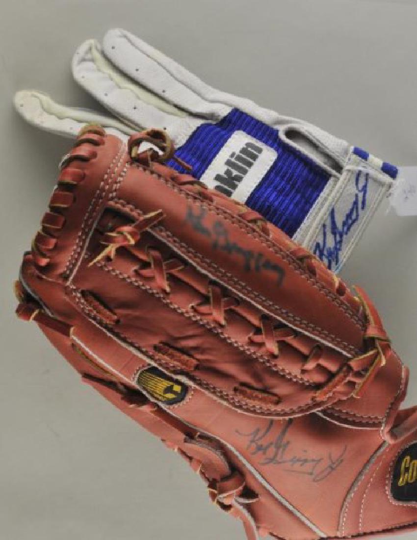 Signed Ken Griffey & Ken Griffey Jr. Gloves (1 of 6)