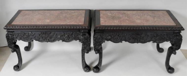 Fine Pr. Anglo-Indian Rosewood Console Tables: 19th century, of rectangular form, each having a variegated purple marble inset top and leaf carved molded edge, shaped apron and sides with elaborate floral and foliate carvings in relief, raised on