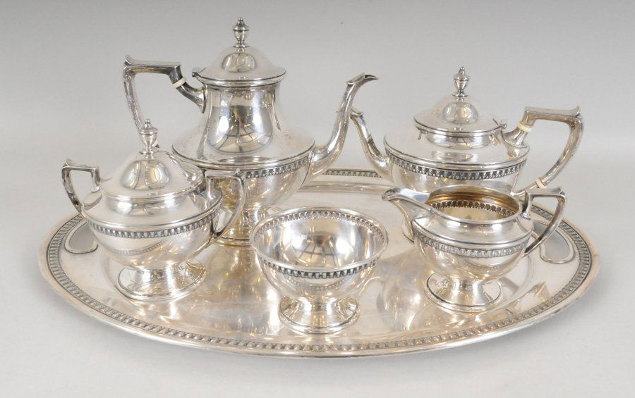 5-Pc. Sterling Tea Service w/ Sterling Tray: Five-piece sterling silver coffee and tea set with matching sterling tray in the Graylock pattern by Concord Silver Co., second quarter 20th century; round bodies with band of egg-and-dart decoration,