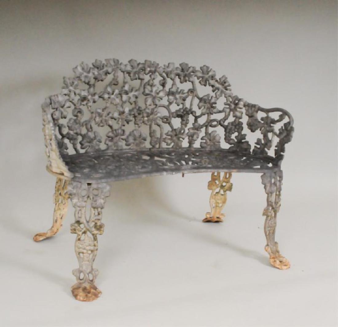 Cast Iron Garden Bench: Grapevine pattern; white paint, American, early 20th century; 38"W, 28"H, 22"D, seat 14 1/2"H; scattered weathering, rust and surface dirt, chips to paint (Ref. 102)