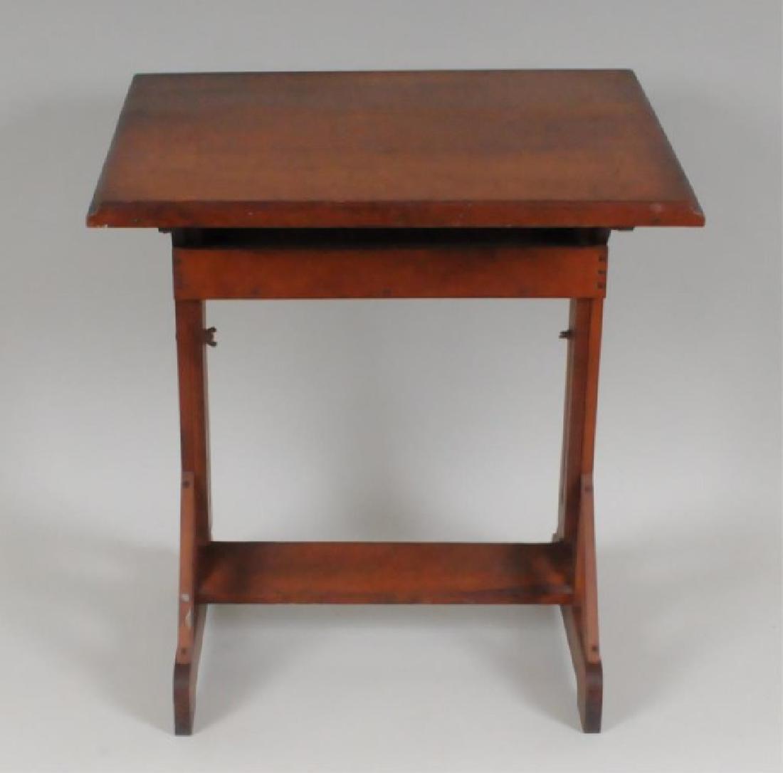 Hand Crafted Clemson College Drafting Table: Pine with adjustable tilt top and adjustable height, open storage compartment below top, trestle base with footrest, signed on underside of top "Made by / B. L. Nalsh / J. E. Webb / J. O. Webster / M.