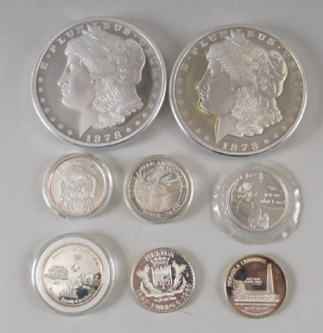 Six Fine Silver & Two Silver Clad Copper Rounds: "American Historic Society One Pound ""1818"" Morgan Silver Dollar Proof - one pound of copper layered in fine silver (x2). 1oz Fine Silver Rounds: ""North American Big Game Super Slam"" (x1), ""Cradl