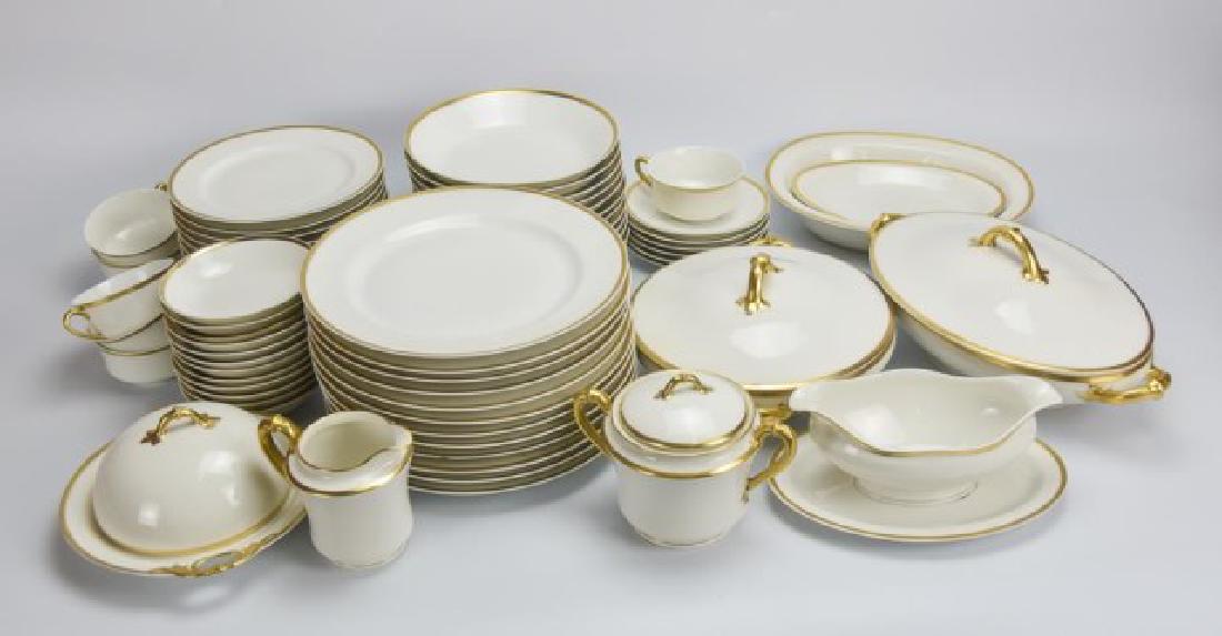 Haviland Gold Rim China Service: 68 pieces, white with gilt rim, marked "Haviland / France", including: Twelve 9 5/8" dinner plates, twelve 7 1/2" salad plates, twelve 7 1/2" soup bowls, twelve 5" berry bowls, six cups and saucers, o