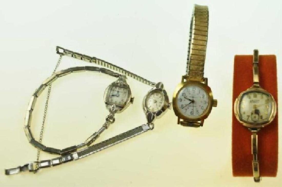 Four Vintage Ladies' Watches: 1. Caravelle Electrotime by Bulova, with original box and case---2. Bulova with two diamond accents, white gold filled, square face, Speidel white gold filled band---3. Bulova, white rolled gold plate