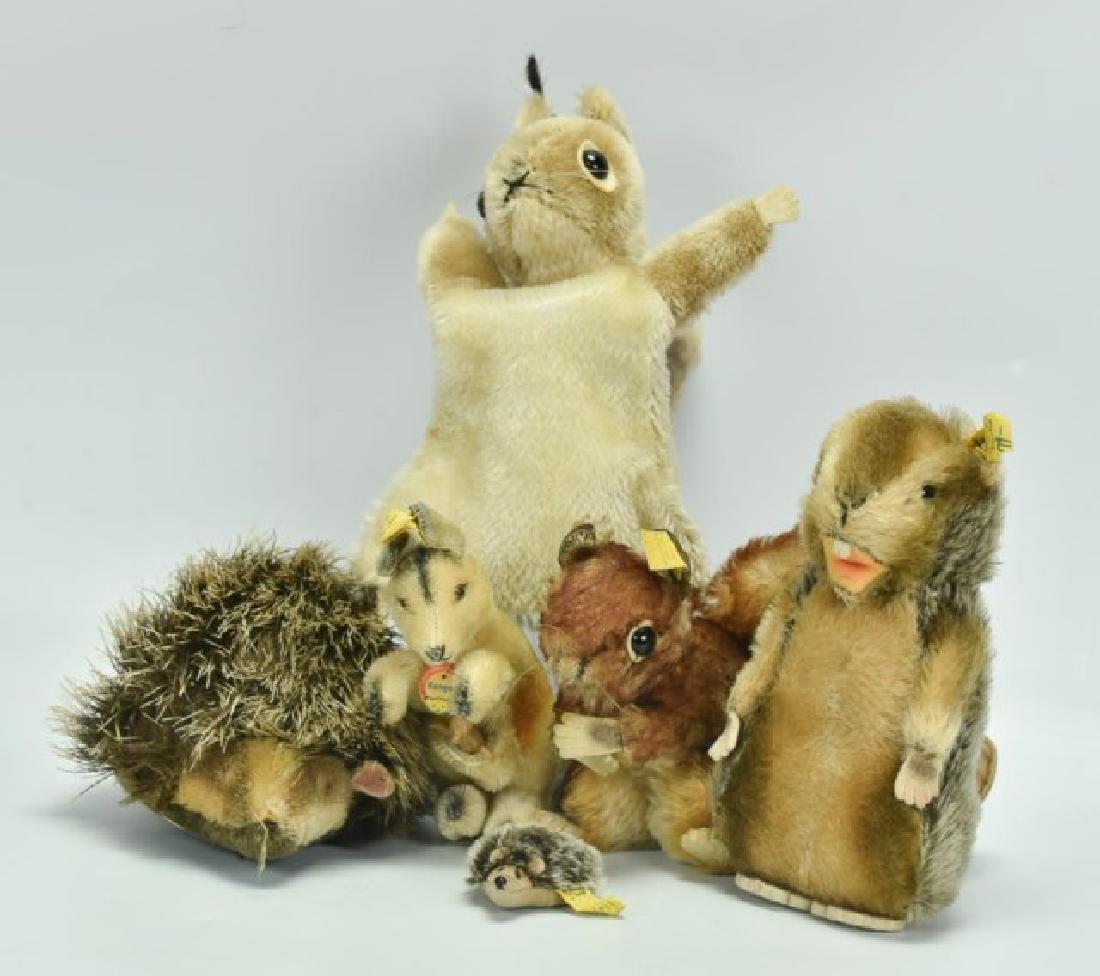 Grouping of 6 Steiff Animal Toys: 1. Beaver, yellow ear tag and button; 7"H; some fur loss to top of head at stitching---2. Squirrel, yellow ear tag and button; 5"H---3. Kangaroo with plastic joey, "Kangoo" chest tag, yellow ear tag a