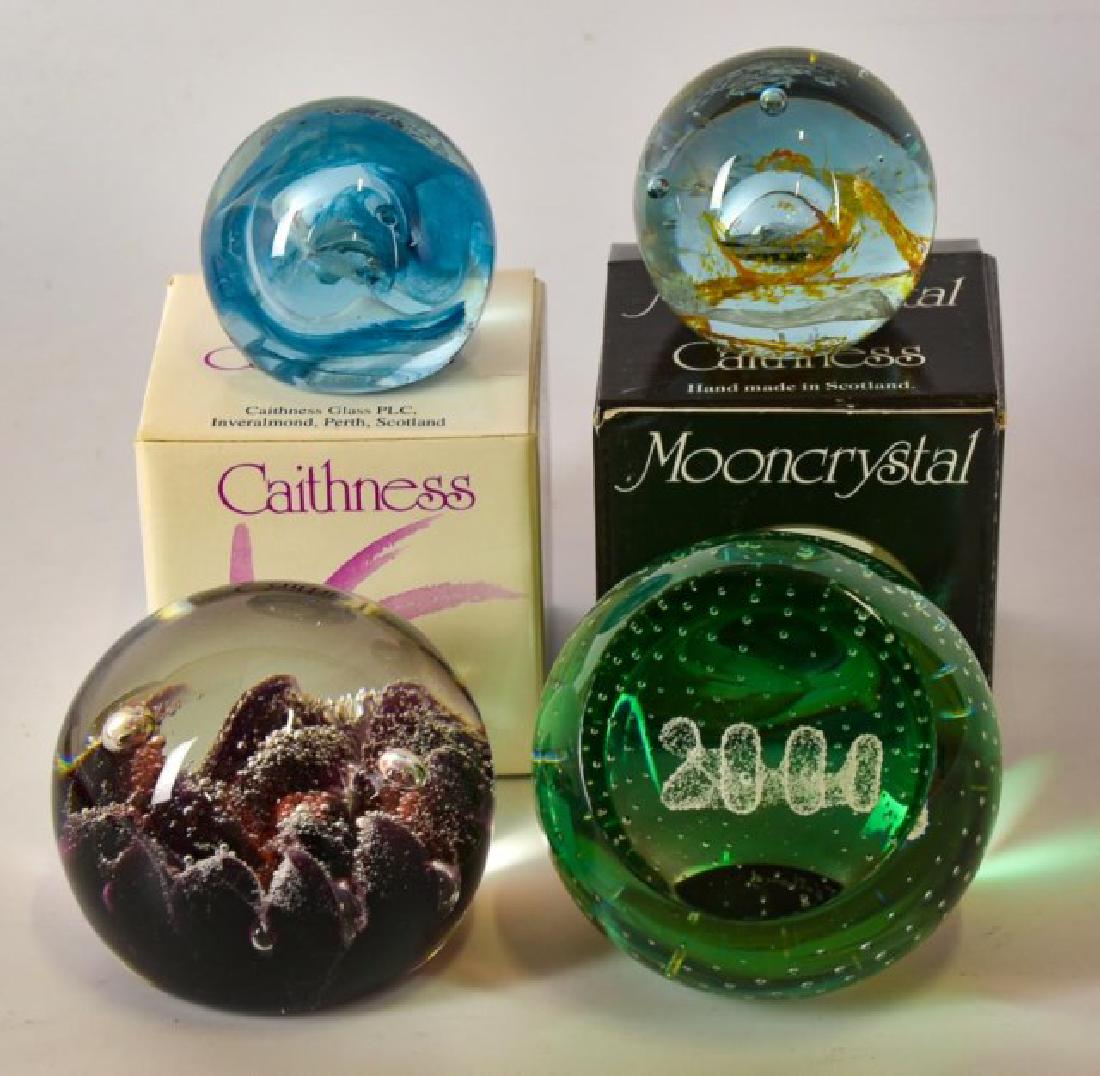4 Caithness Art Glass Paperweights: 1. Limited edition "Mars" paperweight No. 446/500; part of the "Planets", Set 1 limited edition 1970; signed on base "Colin Terris Peter Holmes Caithness 1970 446/500 Mars"; approx. 2 7/8" dia.; good 