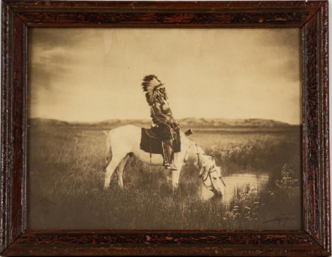 Signed Edward Sheriff Curtis Photograph: (American, 1868-1952), platinum photograph "Oasis in the Badlands", c. 1905, signed "Curtis" lower right in black ink, painted wood frame of the period; sight 15 3/4"W x 11 1/2"H; frame 18 3/4"W x 14 