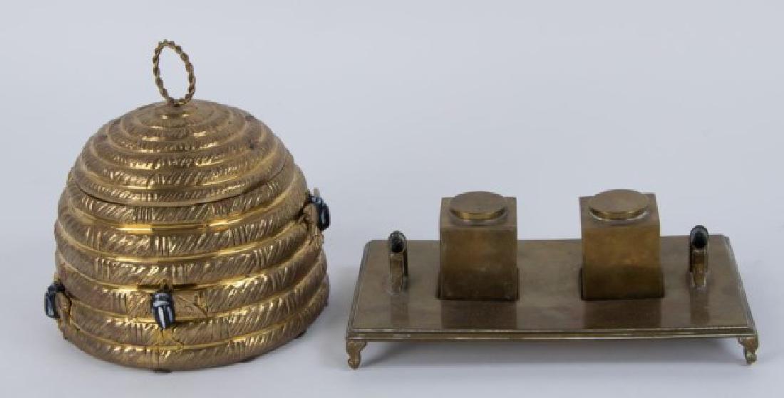 Mottahedeh Brass Beehive Box, Sarreid Inkwell: 1. Brass beehive container with applied enameled brass bees, lid with entwined loop finial handle, base with Mottahedeh paper label; 7" base dia., 7"H; good condition with scattered corrosion---2. Foo