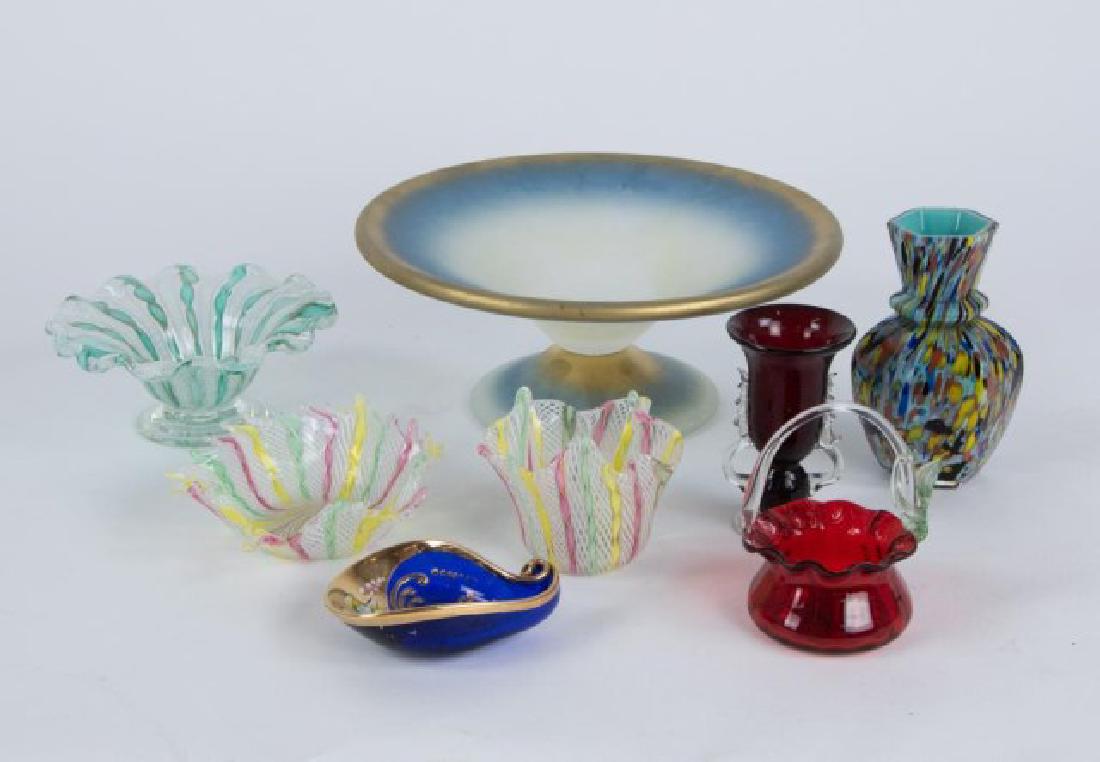 8 Pieces of Italian Art Glass: 1. Avem Murano glass ruby basket with crimped rim and applied clear handle, base with label "Avem / Murano/ Made in Italy"; 3 3/4"H, 2 3/4"W-- 2. Small latticino handkerchief vase with white, pink, gr