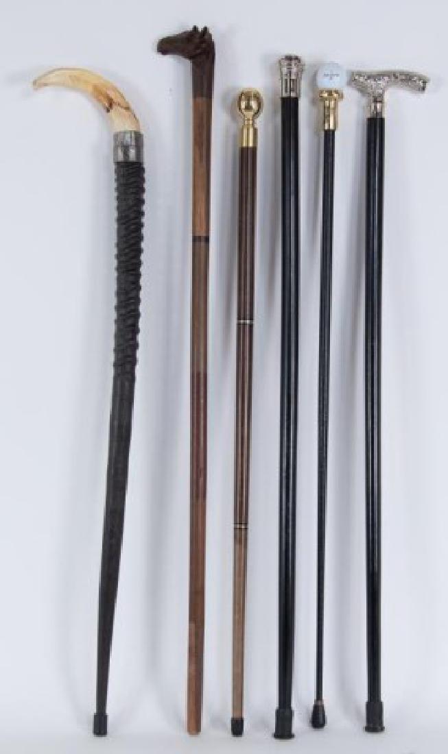 6 Walking Sticks--Watch, Compass, Bridges: 1. Wood walking stick with brass ball handle, top unscrews to reveal a compass; 35"L---2. Black wood walking stick with round silver metal handle containing a watch; 36 1/2"L; working condition unknow