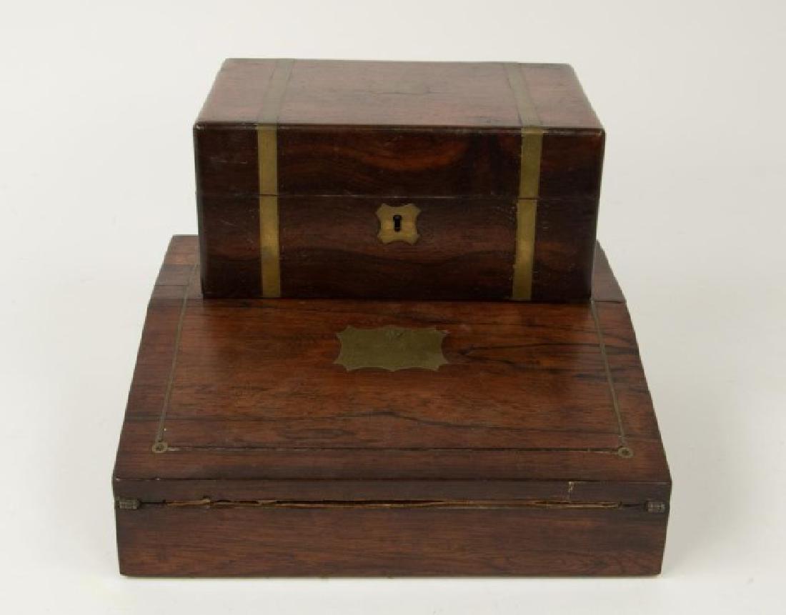 2 Rosewood Lap Desks, Brass Inlaid & Mounted: 1. 19th century rosewood lap or travel desk, brass inlaid case with two hinged lids, slant lid with brass shaped cartouche engraved with arrow through entwined hearts and "Jane Hodnett / Tho lost to s
