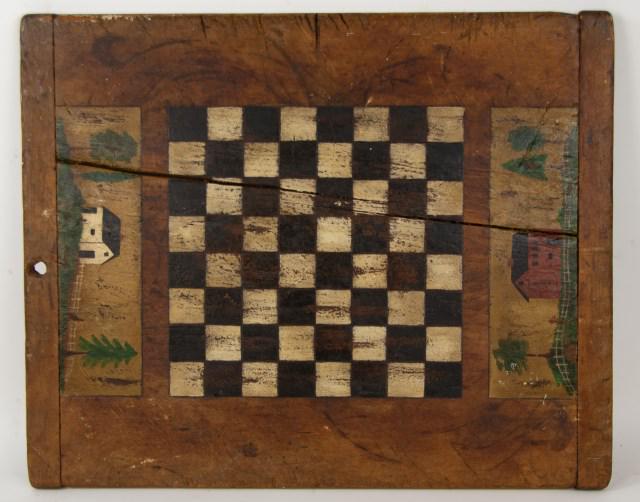 American Painted Wood Gameboard: Late 19th century, breadboard ends, black and cream checker board; each end decorated with a painted rural scene including house, fence and trees; hole in one end for hanging; 19 1/2" x 24 1/4"; age c