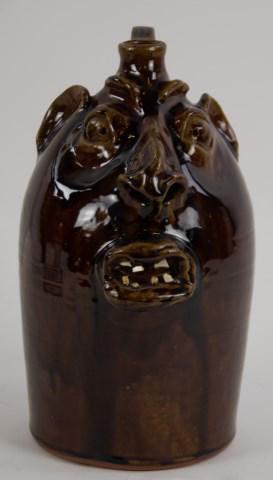 Robert Brown Southern Stoneware Face Jug: Brown glaze, open mouth with china teeth, base signed "Brown's Pottery / Robert Brown"; Arden, North Carolina; 12 3/4"H; good condition (Ref. 52)