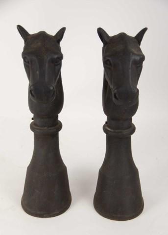 Pair of Cast Iron Figural Horse Andirons: Each depicted as a horse's head over a horse's hoof base; 16 1/2"; lacking billet bars