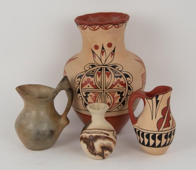 Catawba & Other Native American Pottery: Four pieces: 1. Catawba Indian one-handle pitcher; 5 7/8"H; minor chips/flea bites to rim and tip of spout---2. Jemez Pueblo pottery jar, earthenware with traditional hand painted designs, signed on b