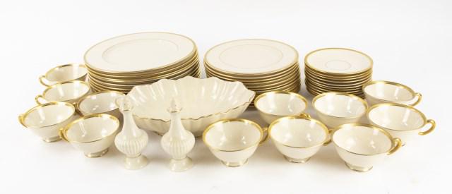 Lenox "Tuxedo" Gold Banded Dinner Service for 12: 51 total pieces of Lenox tableware, ivory with gilt trim, includes: Twelve 10 1/2" dinner plates, twelve 8 1/4" salad plates, twelve cups and saucers all in the Tuxedo pattern by Lenox---Lot also incl
