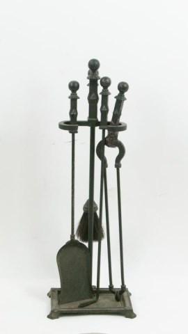 Bradley & Hubbard Arts & Crafts Fireplace Tools: Hammered finials in the Arts & Crafts style; includes stand with shovel, poker, brush and tongs; stand marked on base with Bradley & Hubbard lantern and triangle mark; stand 30 1/2"H, 10 3/4"W, 8 3/4"