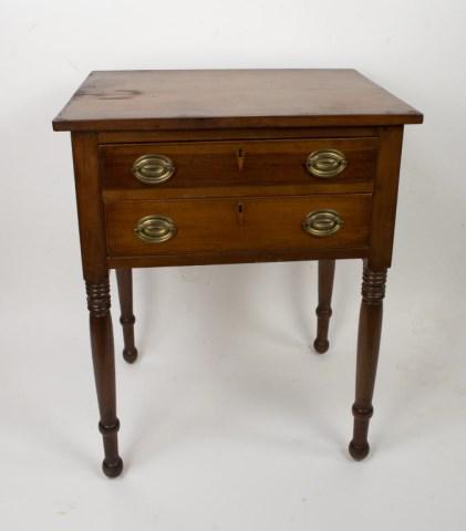 19th C. Sheraton Two-Drawer Stand: American, cherry, pegged construction, two dovetailed graduated drawers, inlaid kite escutcheons, turned legs; 22 3/4"W, 18 1/2"D, 28 1/4"H; age cracks, abrasions commensurate with age and use (Ref. 1