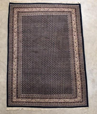 Fritz & LaRue Hand Woven Wool Carpet, 6' x 9': Navy field with repeating stylized boteh; navy, ivory and slate guard borders; back with two labels "Fritz And LaRue" and "Kaimuri / Made In India / 17723"; 6'W x 9'L; good estate condition (Ref. 382)