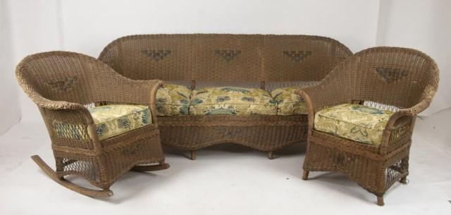 High Point Bending & Chair Co. 3-Pc. Wicker Set: Three-piece brown wicker set having woven green accents, each piece with upholstered loose cushions, rocker with tag "High Point Bending & Chair Co. / Cablewove / Siler City, NC"; set includes sofa, 8